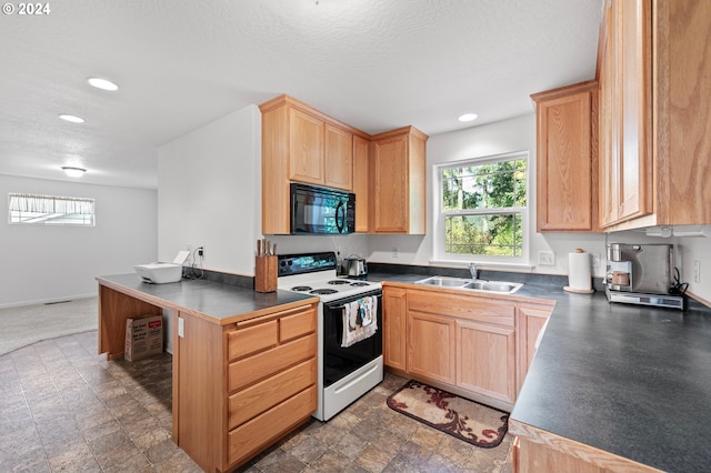 kitchen with light brown cabinets, a textured ceiling, sink, and white range with electric cooktop