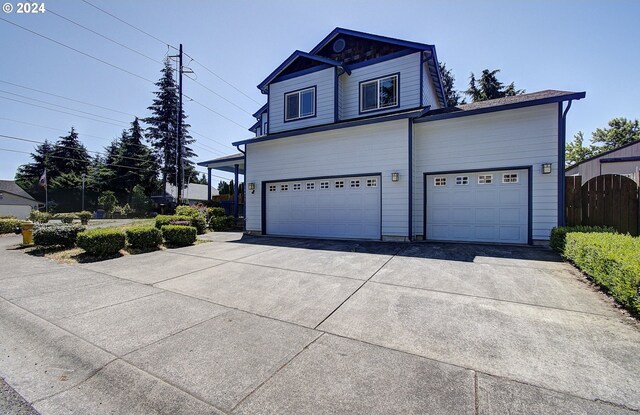 front of property with a garage