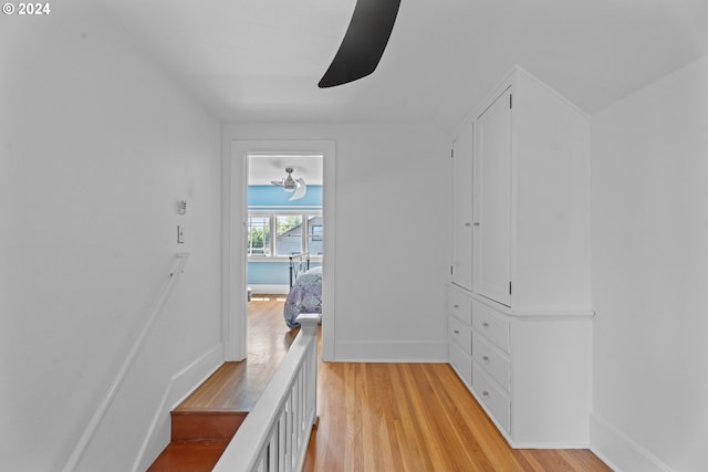 corridor featuring light hardwood / wood-style floors