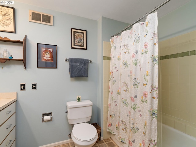 full bathroom featuring toilet, shower / tub combo, vanity, and tile flooring