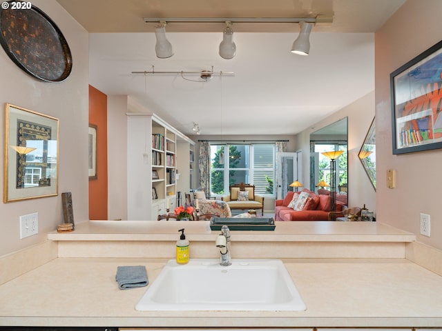 kitchen with track lighting and sink