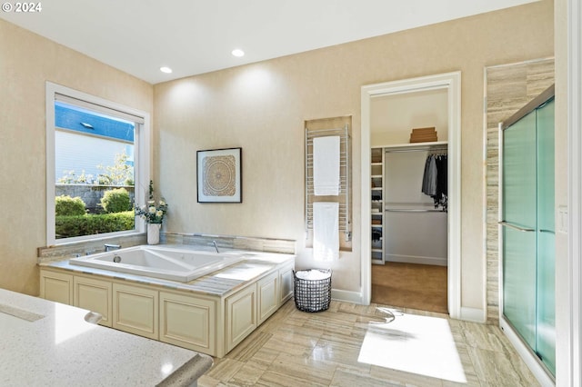 bathroom with tile floors and plus walk in shower