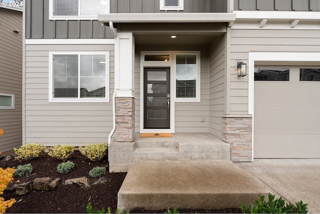 property entrance featuring a garage