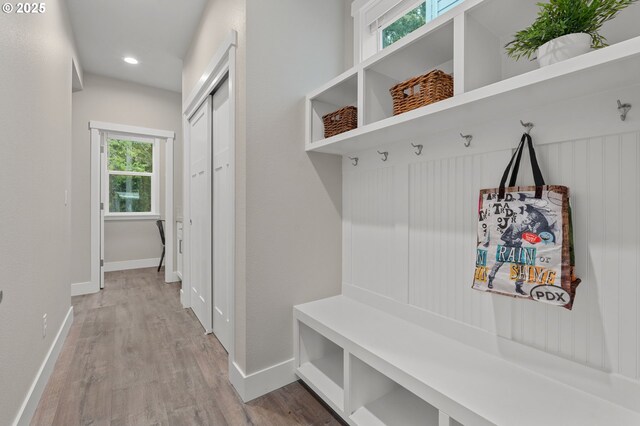 unfurnished bedroom featuring light colored carpet and a closet