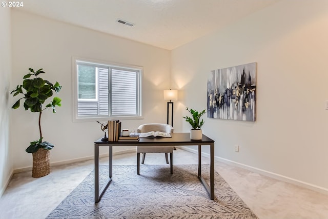 home office featuring light carpet