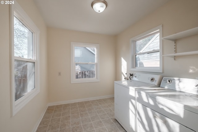 laundry room with washing machine and dryer