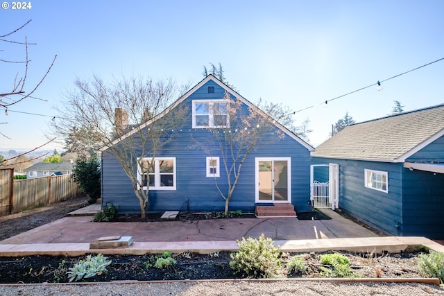 895 Hilltop Dr, Salem, OR 97304 - rear view of house with a patio, a chimney, and entry steps