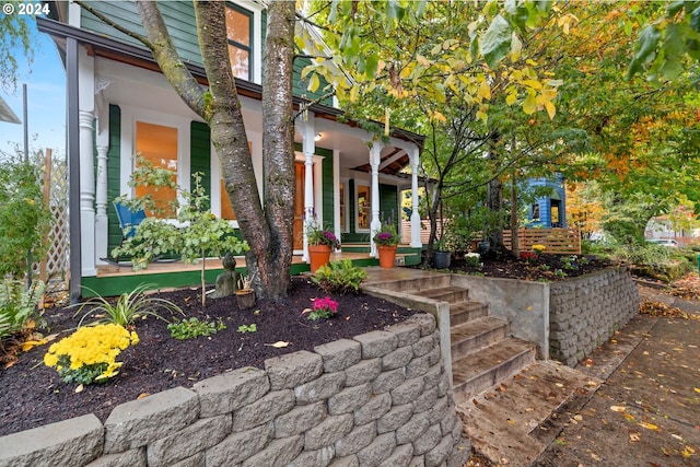 doorway to property with covered porch