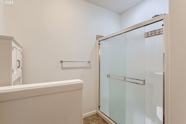 bathroom with an enclosed shower