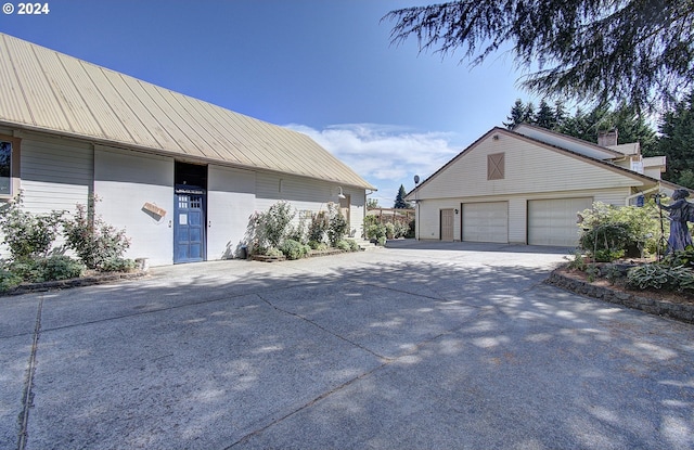 exterior space with a garage