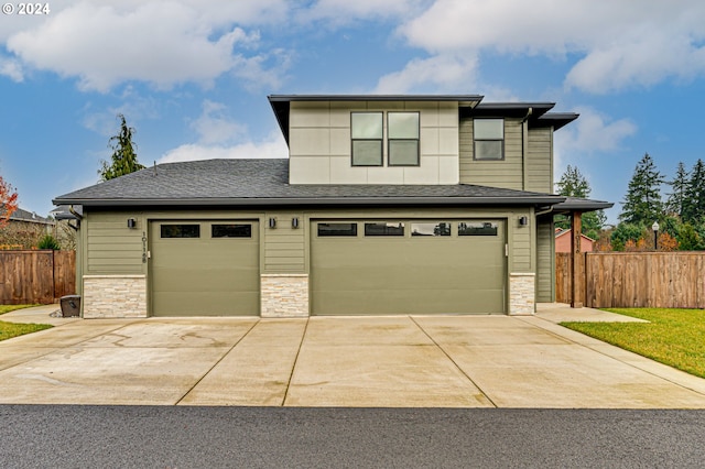 view of front of house with a garage