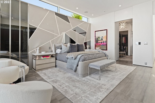 bedroom with light hardwood / wood-style flooring