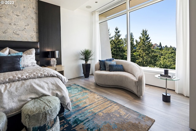 bedroom with light wood-type flooring