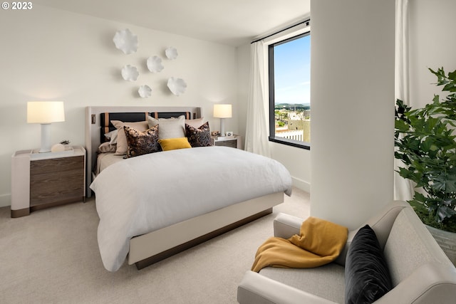 bedroom featuring light colored carpet and a wall of windows