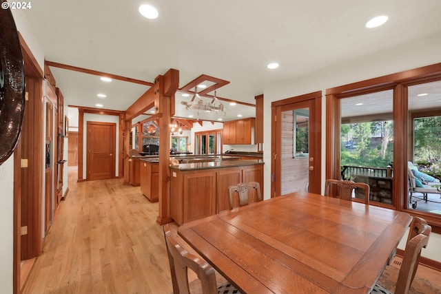 dining space with light wood-type flooring