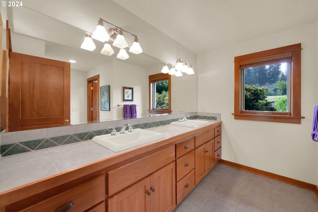 bathroom featuring vanity and tile patterned flooring