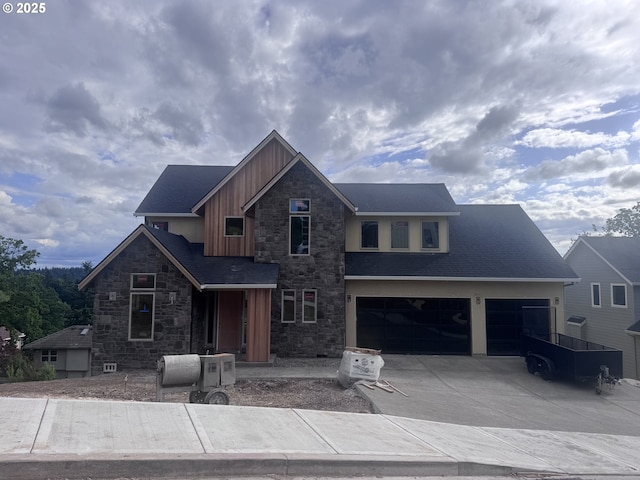 3734 Landis St, West Linn, OR 97068 - craftsman house featuring stone siding, board and batten siding, driveway, and an attached garage