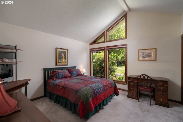 carpeted bedroom featuring a textured ceiling and vaulted ceiling with beams