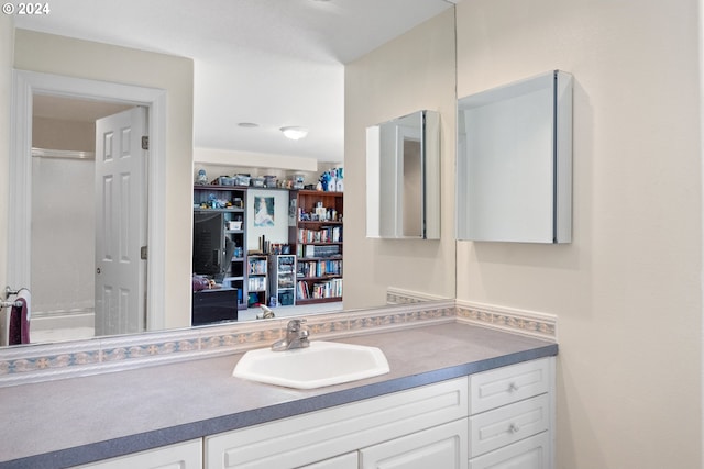 bathroom featuring large vanity