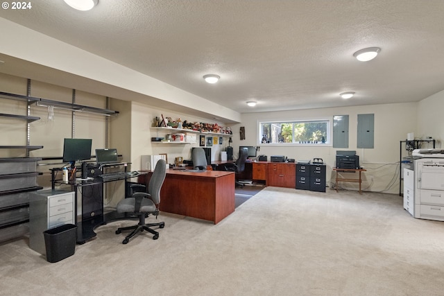 carpeted home office with a textured ceiling