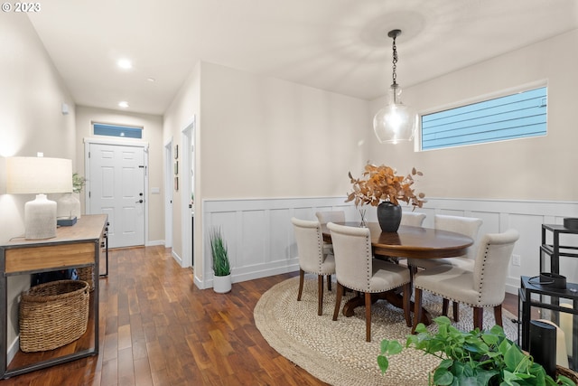 dining area featuring dark hardwood / wood-style flooring