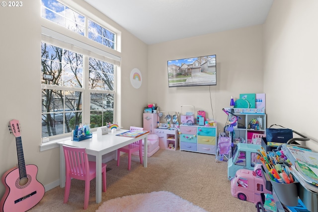 game room featuring carpet floors and a healthy amount of sunlight