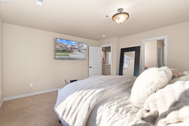 bedroom with light carpet