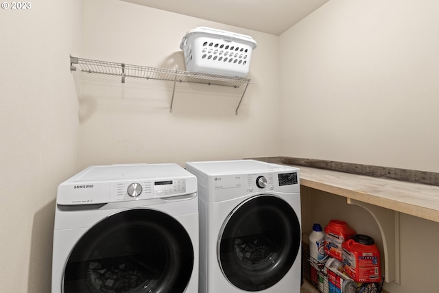 washroom featuring separate washer and dryer