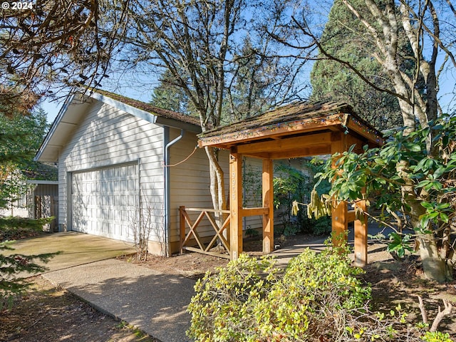 view of outdoor structure with a garage