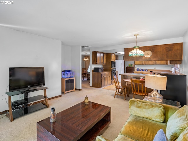 living room with light carpet