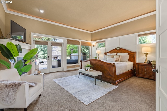 bedroom featuring access to exterior, french doors, carpet flooring, and multiple windows