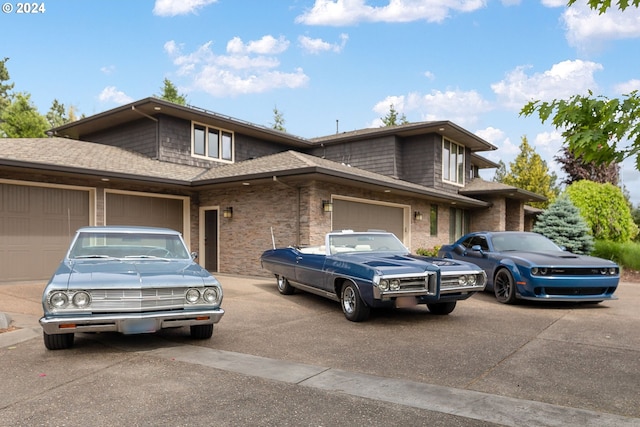 prairie-style home featuring a garage