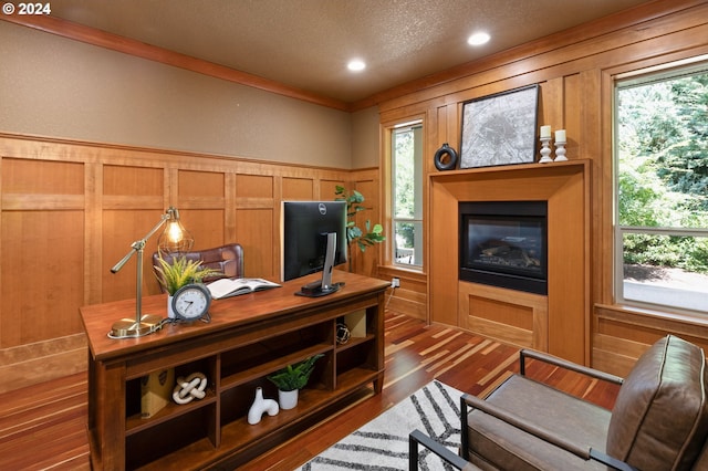 interior space featuring plenty of natural light and dark wood-type flooring