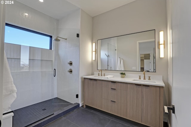 bathroom featuring tile patterned floors, vanity, and an enclosed shower