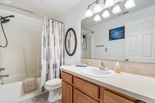 full bathroom with backsplash, tile patterned floors, vanity, shower / bath combo with shower curtain, and toilet