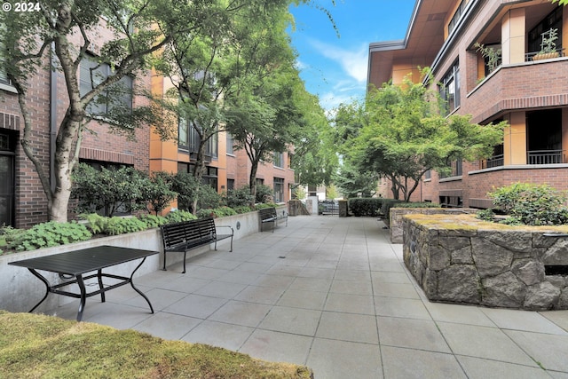 view of property's community featuring a patio