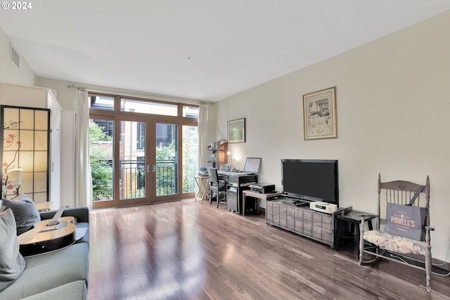 living room with french doors and wood finished floors