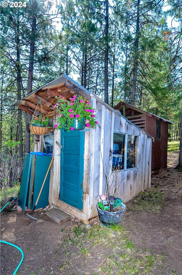 view of outbuilding featuring an outdoor structure