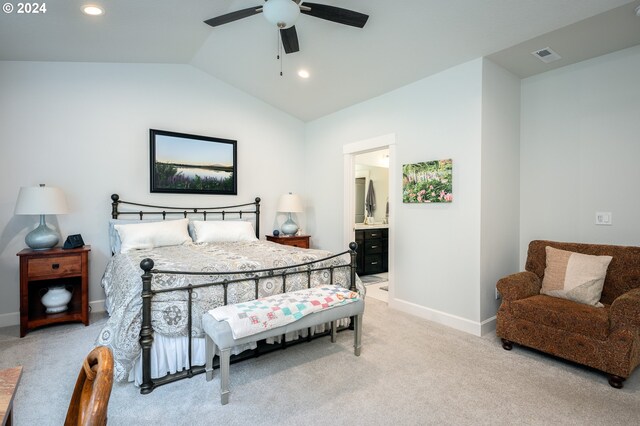 carpeted bedroom featuring ceiling fan, connected bathroom, and lofted ceiling