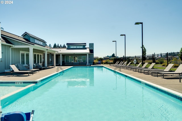 view of swimming pool featuring a patio