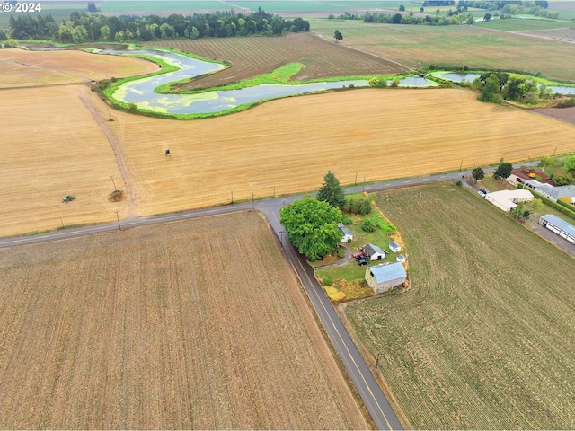 bird's eye view with a rural view and a water view