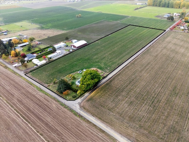 birds eye view of property featuring a rural view