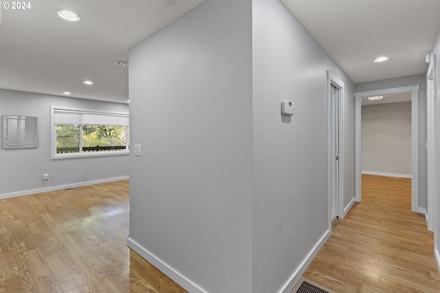 hall featuring light hardwood / wood-style floors