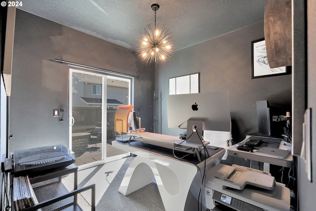 office area with a notable chandelier and a textured ceiling