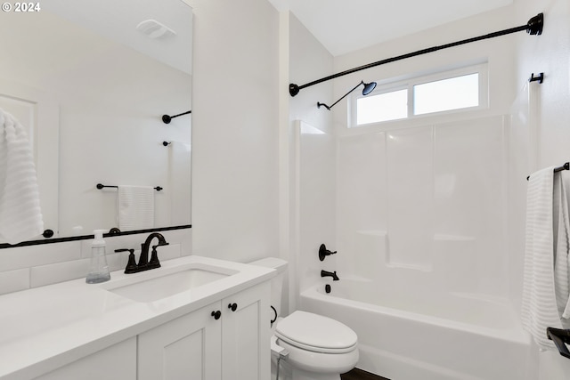 full bathroom featuring shower / bathtub combination, vanity, and toilet