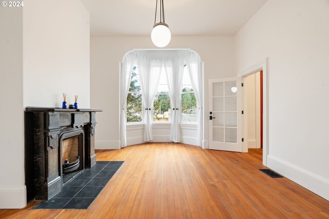 interior space with hardwood / wood-style floors