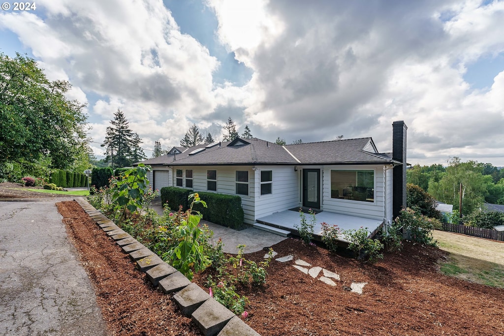 rear view of property with a patio