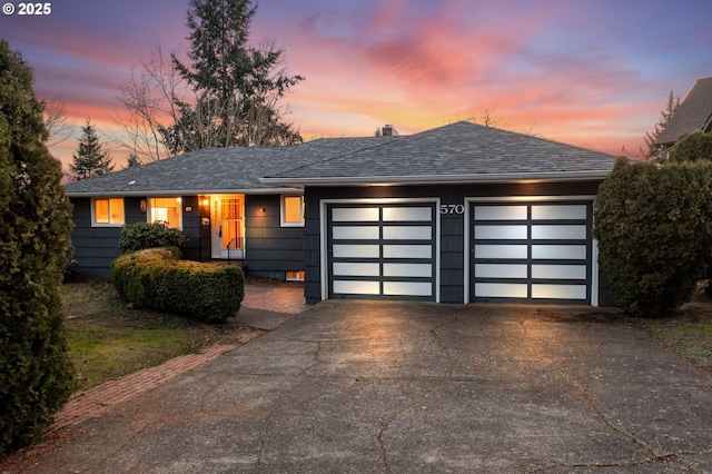 view of front of home with a garage