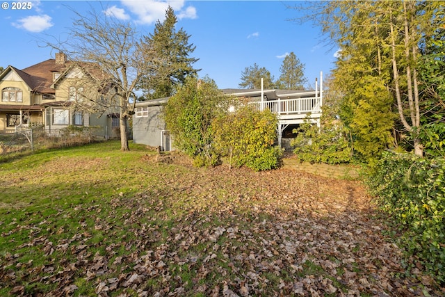 view of yard with a wooden deck