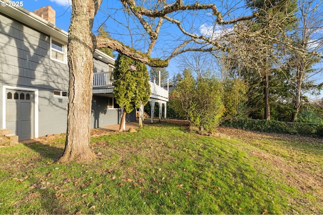 view of yard with a deck